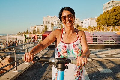 Buy stock photo Portrait of woman on electric scooter, retirement and summer ride at tropical island resort for happy vacation. City, street and eco friendly transport, fun grandma on escooter on holiday in Hawaii.