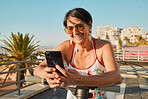 Senior woman, phone and scooter of a person on holiday in Florida feeling happiness in the sun. Social media scroll, text and travel of a elderly female on 5g mobile connection with smile in summer 