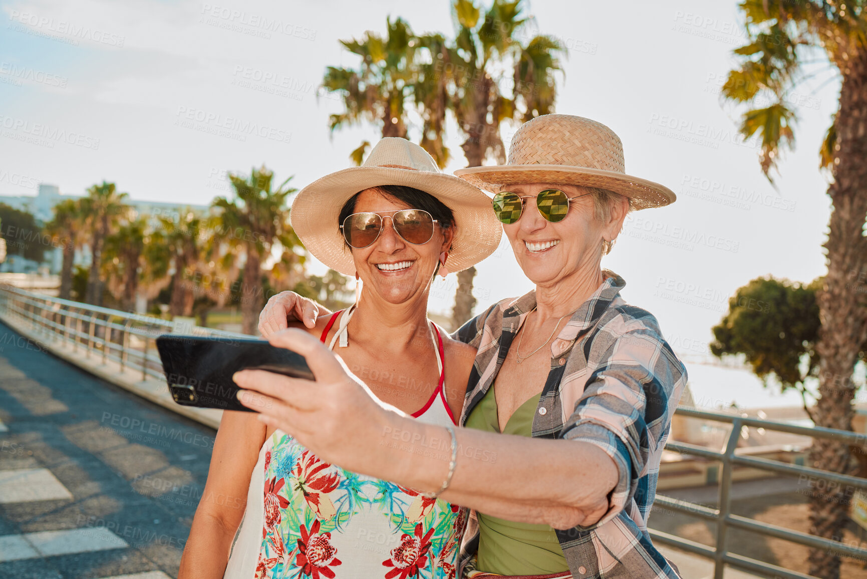 Buy stock photo Happy friends, selfie and holiday smile in Miami with happiness from summer travel and vacation. Beach, mobile connection and online mature women by the sea with happiness on 5g for social media