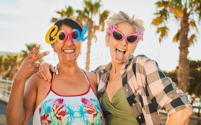 Buy stock photo Vacation, funky sunglasses and senior women in retirement on a summer weekend trip together. Happy, freedom and elderly female friends with stylish spectacles having fun while on a holiday adventure.