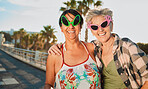 Fun, sunglasses and senior women hug, happy and laugh on vacation, trip or summer holiday on blurred background. Face, friends and elderly lady embrace while travel, bond or enjoy retirement together