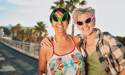 Buy stock photo Funny, sunglasses and senior women hug, happy and laugh on fun vacation, trip or crazy summer holiday with mockup. Face, friends and elderly lady embrace while travel, bond or enjoy retirement