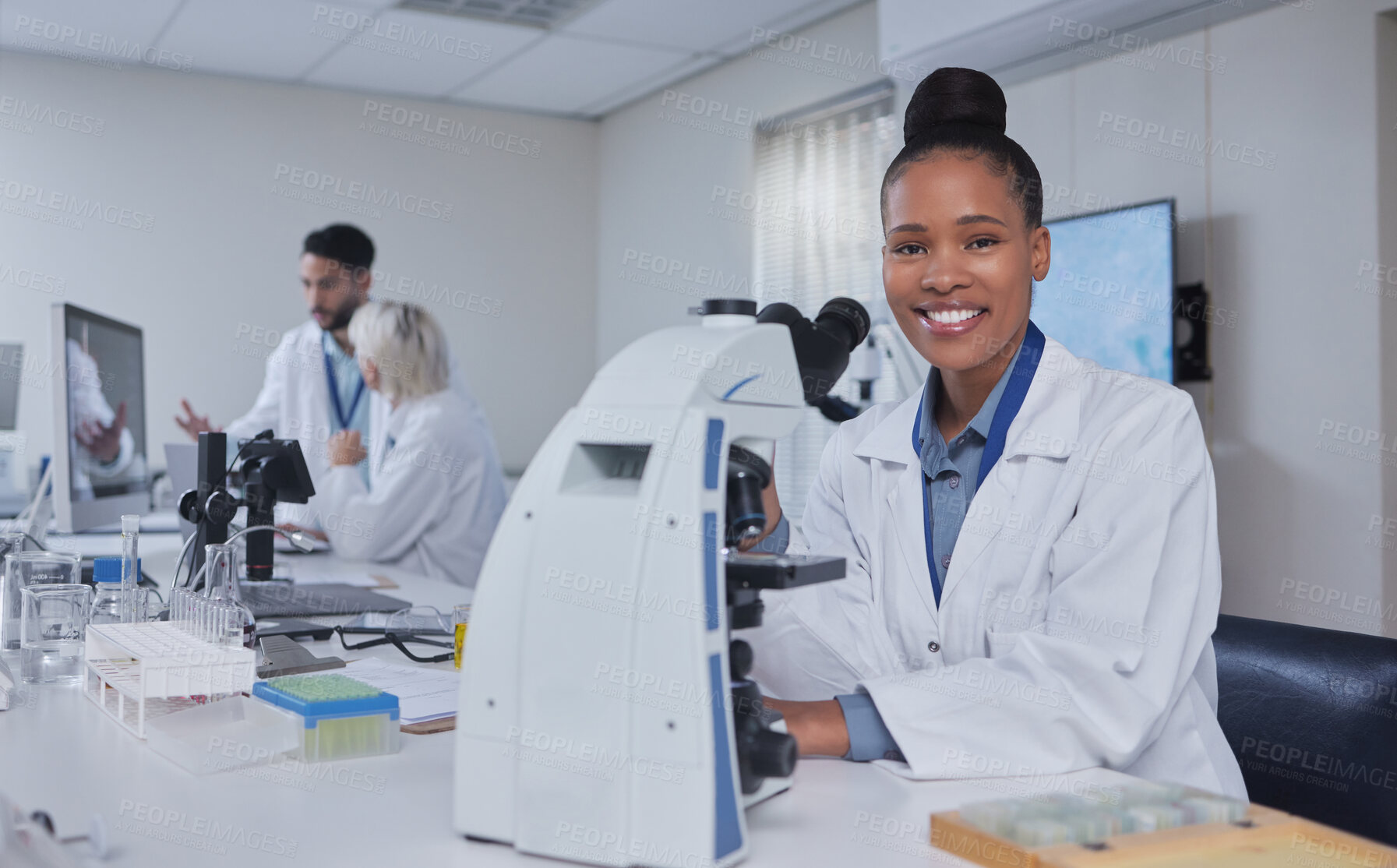 Buy stock photo Black woman, microscope and portrait of scientist in laboratory for research, experiment or innovation. Science, technology and happy female medical doctor with equipment for sample analysis or test