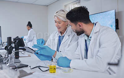 Buy stock photo Communication, teamwork or scientist working on tablet in lab for medical search, innovation or science study in lab. Medicine or doctors assistant on tech for healthcare or wellness DNA research