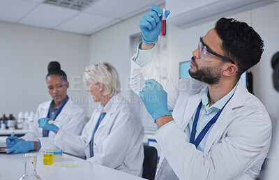 Buy stock photo Science, laboratory and man with blood in test tube for medical research, dna testing and investigation. Biotechnology, teamwork and forensic scientists with sample for analysis, study and experiment