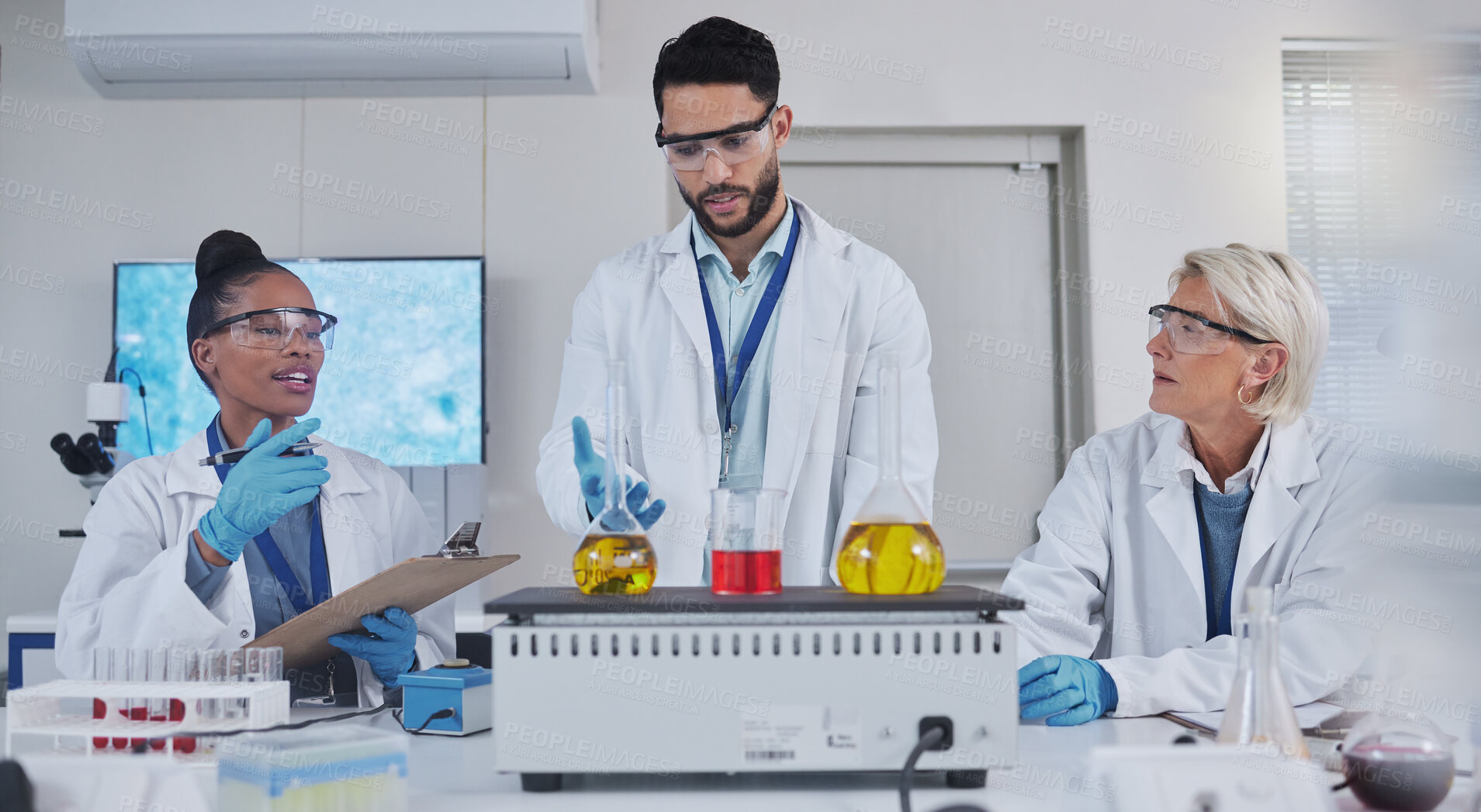 Buy stock photo Science, laboratory and team with chemistry liquid in glass beaker for medical research, study and vaccine. Biotechnology, pharmaceutical and scientists with sample for analysis, test and experiment