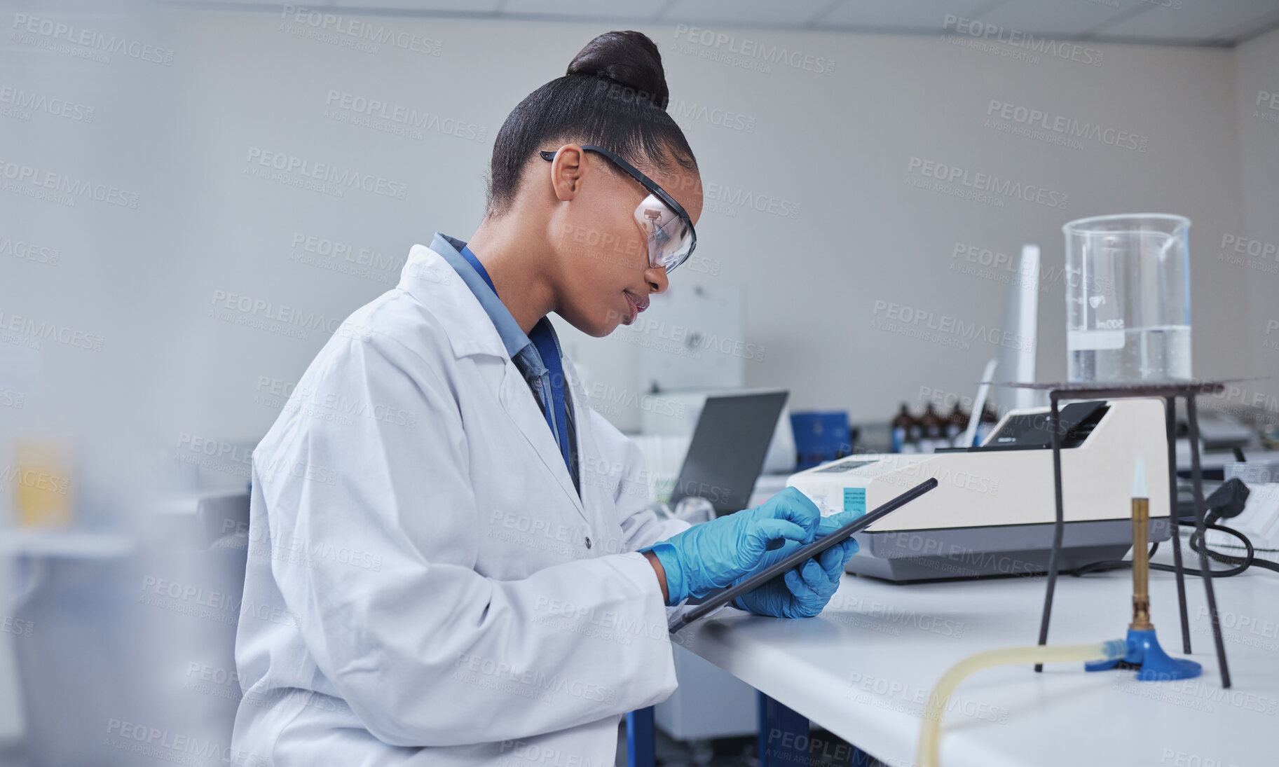 Buy stock photo Research, focus scientist or black woman on tablet in lab for medical search, innovation or science study. Medicine, internet or doctor on tech for healthcare or wellness DNA data review in hospital