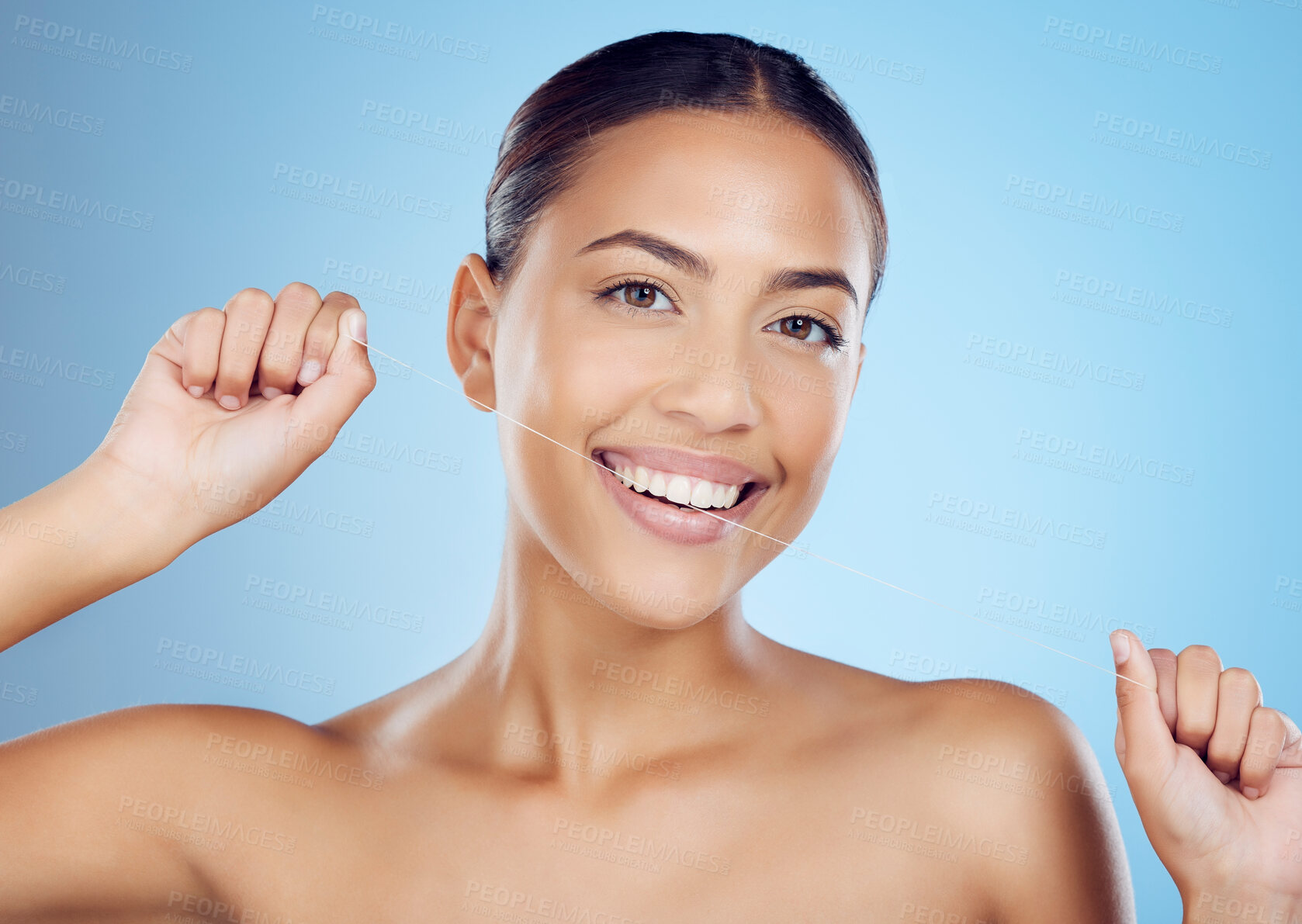 Buy stock photo Floss, dental wellness and portrait of woman in studio for beauty, healthy body and hygiene on blue background. Female model, tooth flossing and cleaning mouth for facial smile, breath or happy teeth