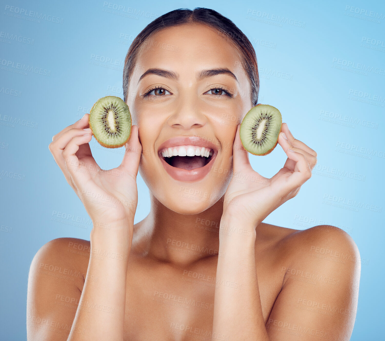 Buy stock photo Kiwi, woman and portrait of smile for skincare, beauty and wellness food on studio background. Happy model, organic green fruits and natural cosmetics for detox, facial benefits and aesthetic glow 