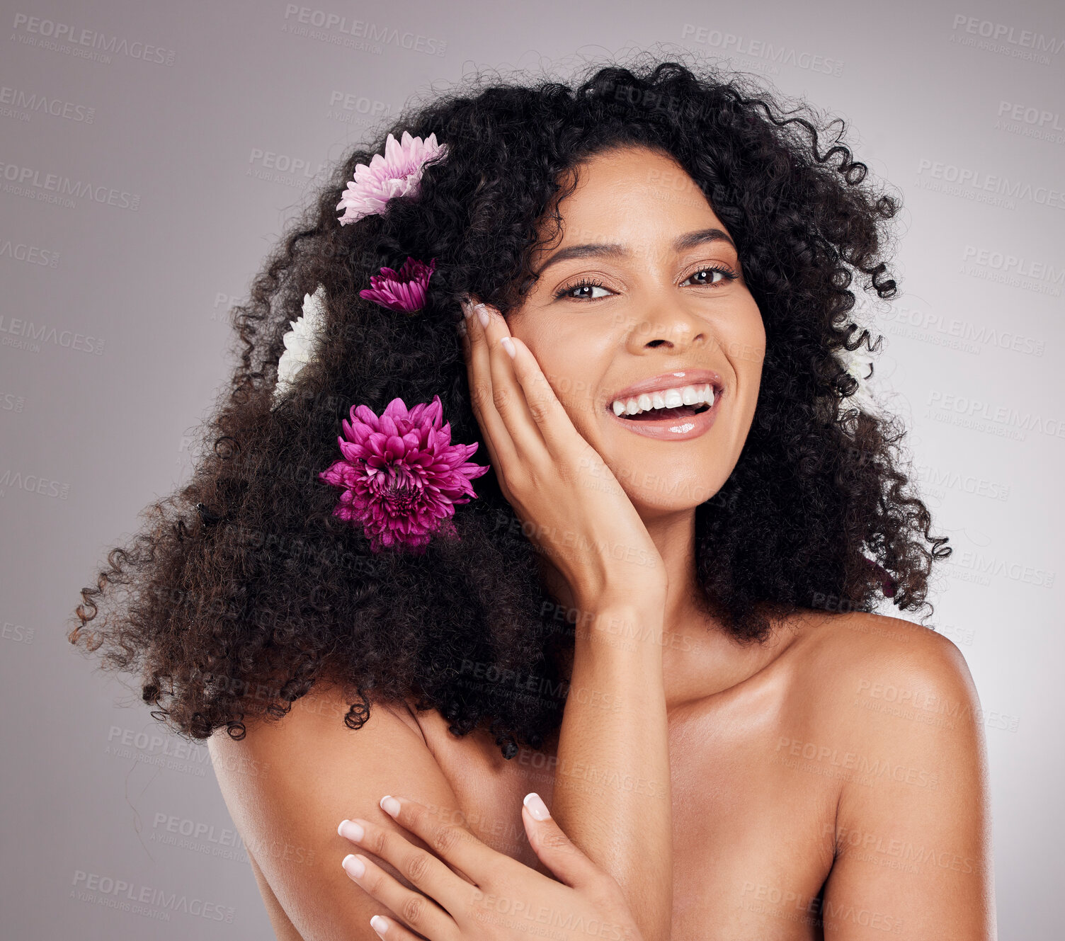 Buy stock photo Skincare, face of black woman or flowers in hair studio for body wellness, luxury spa or self care. Aesthetic, beauty facial portrait or girl model with plants for cosmetics product or nature smile