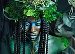 Plant, crown and fantasy with black woman and queen for evil, halloween and dark magic. Fashion, aesthetic and horror with women and creative art for beauty, danger and energy with studio background