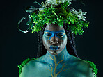 Plant crown, black woman and beauty of face with makeup on dark background with tropical leaf. Fairy model person or Queen of nature, ecology and sustainability for freedom art with natural wreath