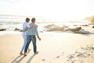 Buy stock photo Beach, love and mockup with a senior couple walking on the sand by the ocean or sea for sunset romance. Nature, summer or back with a mature woman and man taking a romantic walk together on the coast