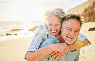Buy stock photo Senior couple, beach and piggyback portrait with smile together, summer and walk for memory, comic time or care. Elderly man, old woman or hug for funny moment, outdoor or sunshine by waves with love