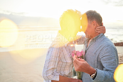 Buy stock photo Flare, mockup and romance on the beach with an old couple outdoor in nature to celebrate valentines day. Summer, love or flowers with a senior man and woman celebrating on the coast together