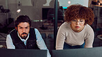Serious, teamwork and digital with people at computer for programming, coding and software. Developer, technology and database with man and black woman for cloud computing, code and cyber security