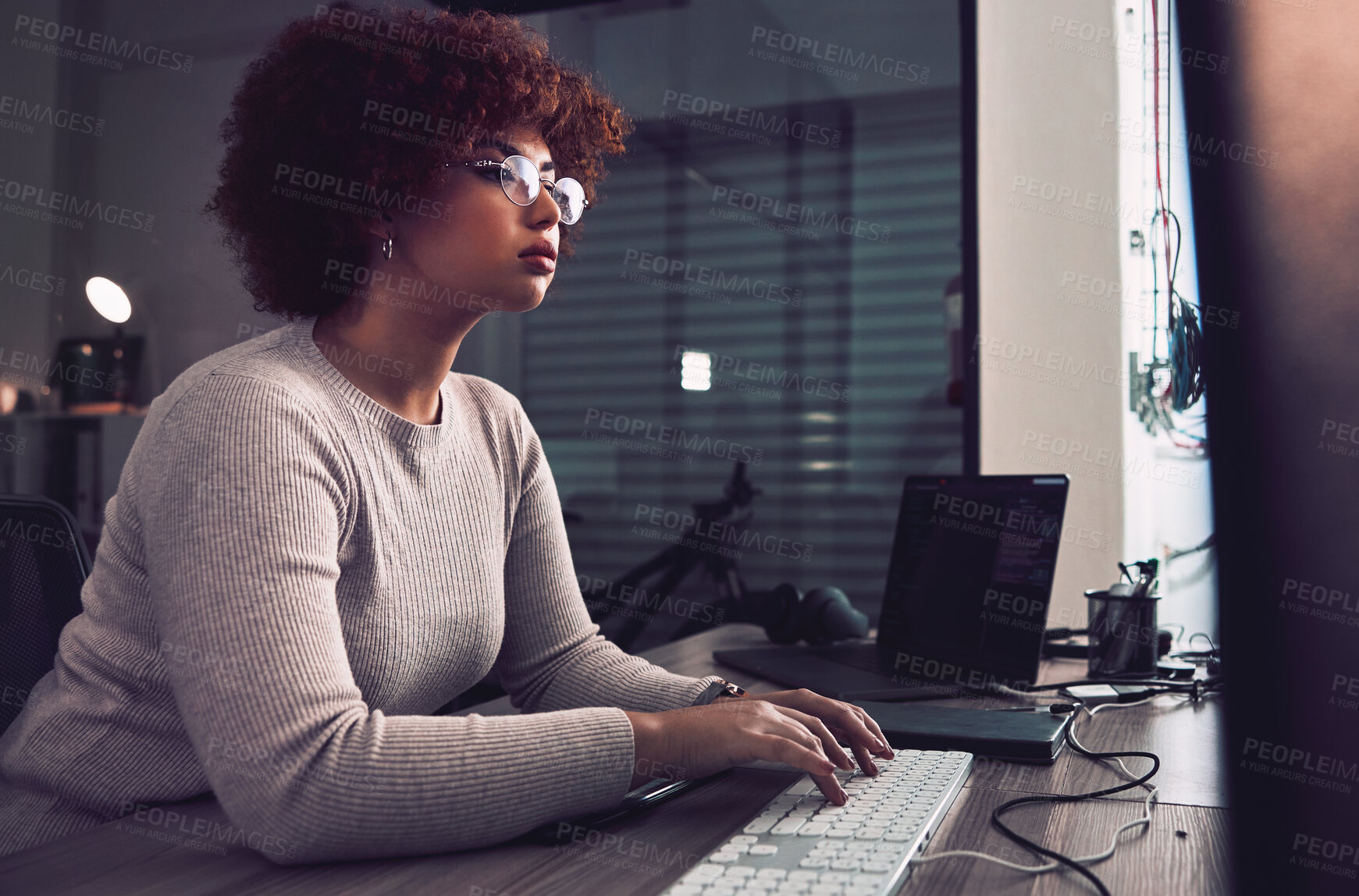Buy stock photo Night, computer typing and black woman programmer, software developer and cybersecurity internship. Coding, programming and USA person or developer data analytics, information technology and research