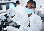 Science, covid and testing with a black woman doctor working in a laboratory for research or innovation. Medical, analytics and development with a female scientist at work in a lab for chemistry