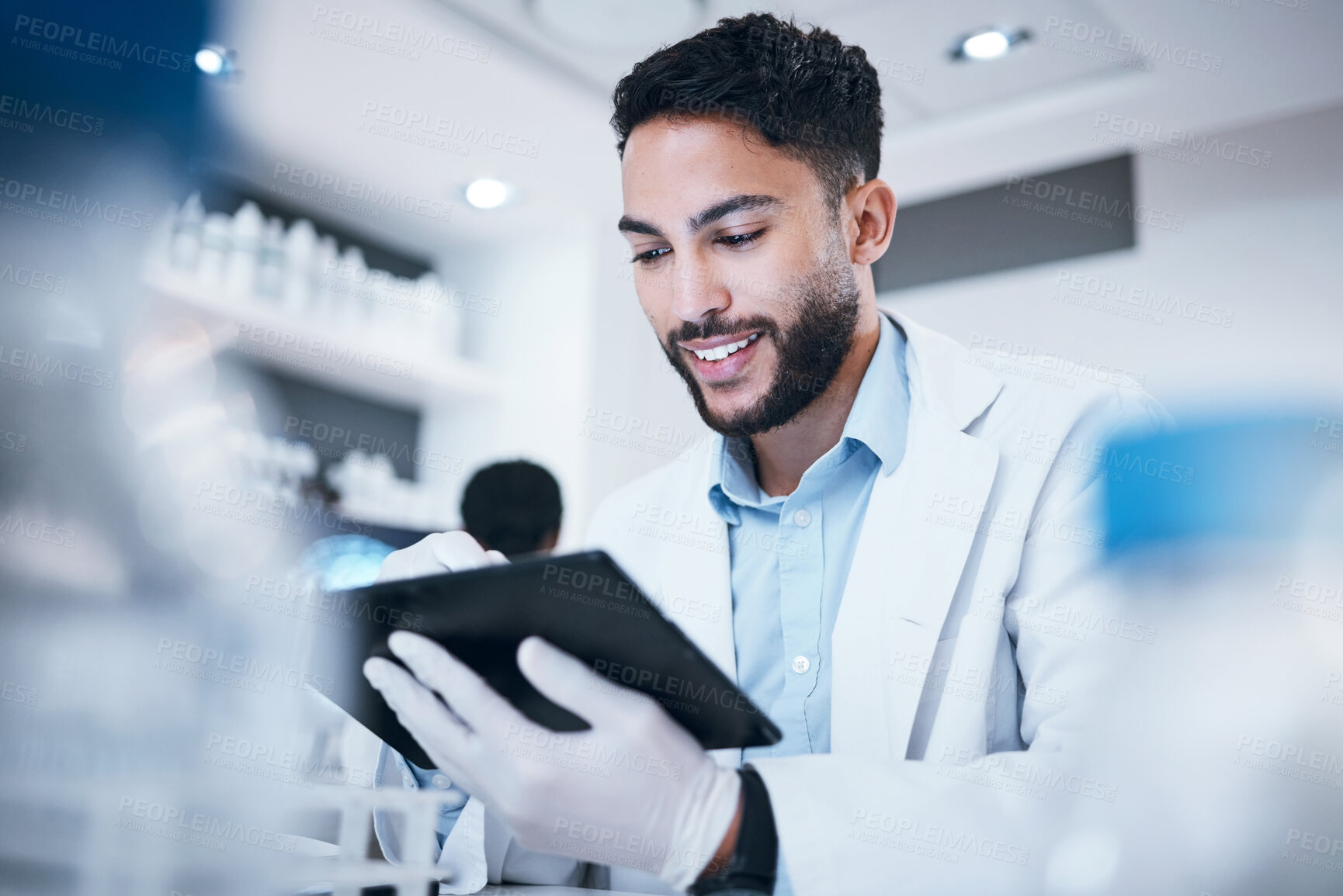 Buy stock photo Science, smile and tablet with man in laboratory for medicine, pharmacy and healthcare vaccine. Medical, internet and technology with expert reading data for experiment, investigation and cure