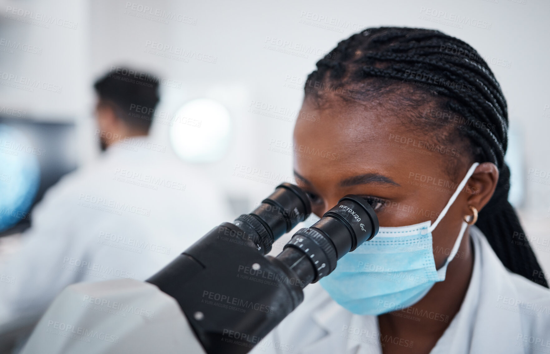 Buy stock photo Microscope, covid scientist and black woman in laboratory for experiment, research or analysis. Science, innovation and female doctor or medical expert with equipment for testing bacteria and corona.