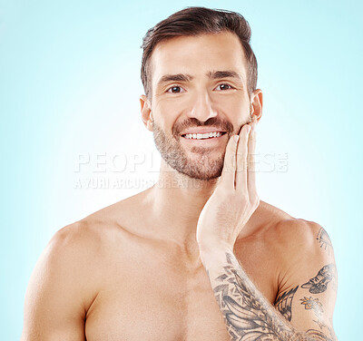 Buy stock photo Face, portrait and skincare of man in studio isolated on a blue background. Beauty wellness, dermatology cosmetics or male model happy after spa facial treatment for healthy, glowing or flawless skin