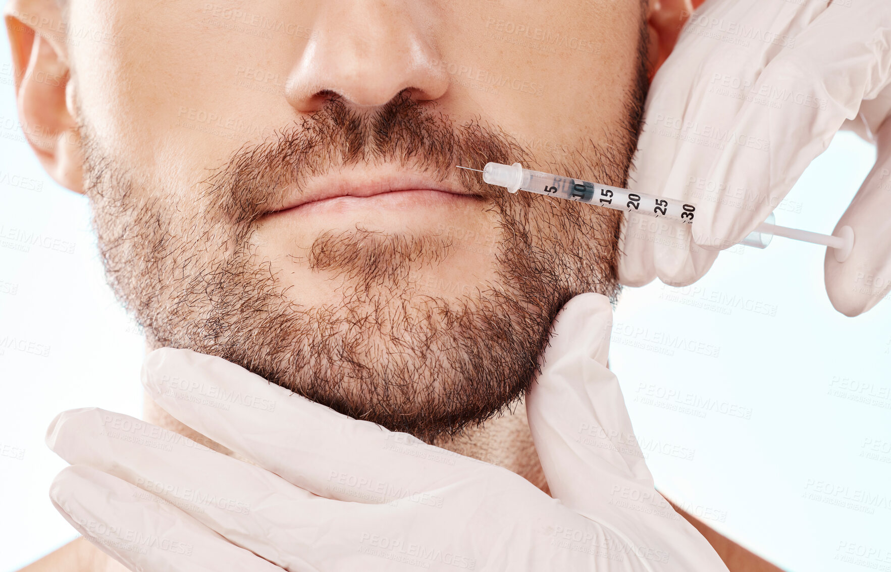 Buy stock photo Man, lip filler injection and mesotherapy with face, hands and needle syringe and beauty on blue background. Dermatology, cosmetic care and procedure, health and skincare with wellness and collagen