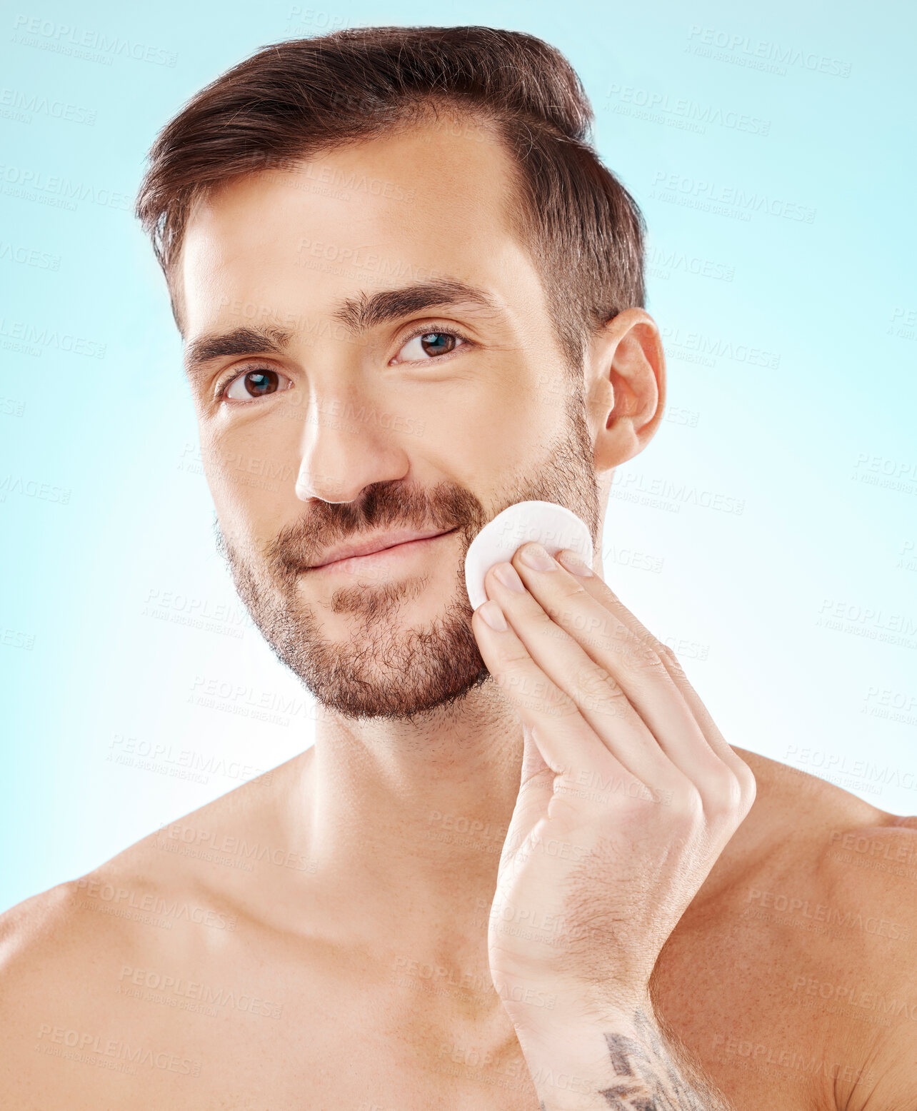 Buy stock photo Happy, skincare and cotton with portrait of man for toner, makeup remover and hydration cosmetics. Facial, wellness and spa treatment with model and cleaning face for self care, glow and dermatology