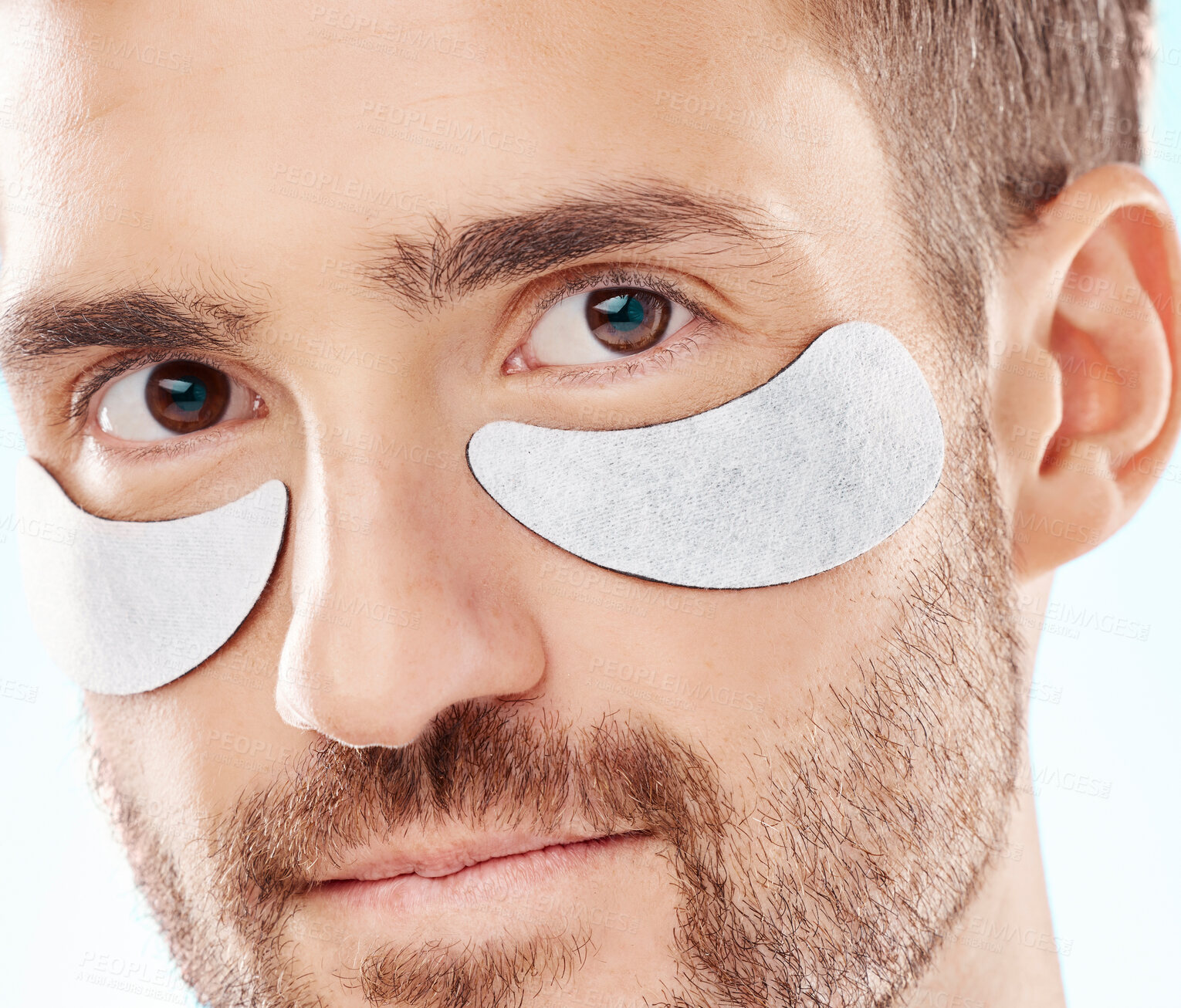 Buy stock photo Eye beauty, man portrait and treatment patches for eyes in a isolated studio with white background. Skincare, spa wellness and facial for model face with cosmetics, dermatology and detox with mask