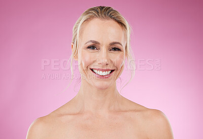 Buy stock photo Beauty, skincare and portrait of woman with smile, glowing skin and and natural spa makeup in studio. Mockup, advertising and luxury cosmetics, face of happy blonde model isolated on pink background.