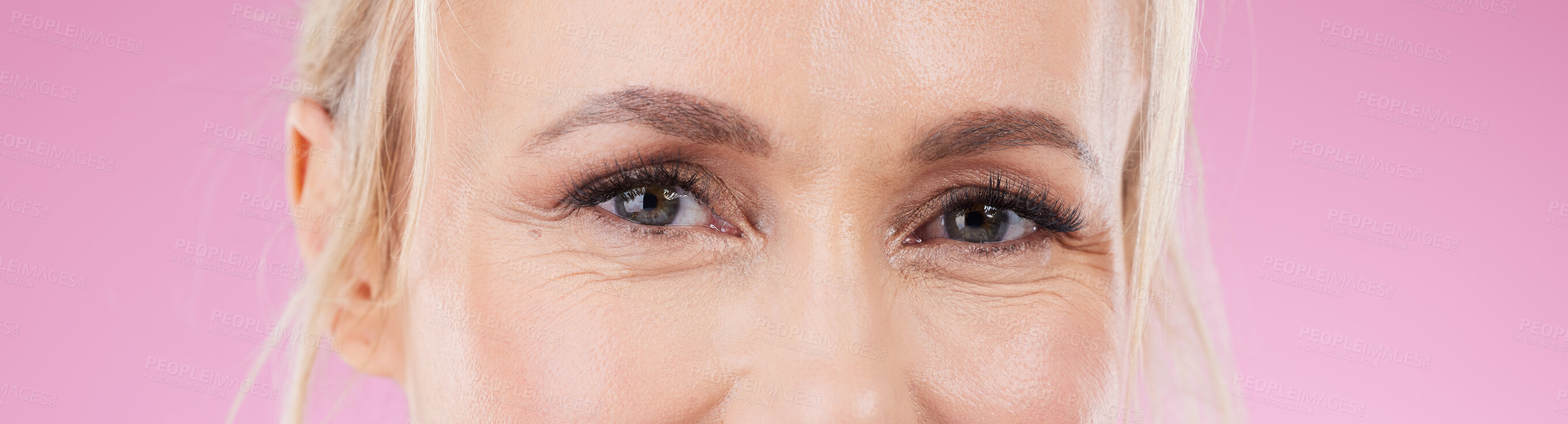 Buy stock photo Beauty, eyes and portrait of woman on pink background for wellness, skincare and cosmetics in studio. Vision, cropped headshot and face zoom of happy female for eyesight, optometry and microblading