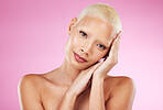 Portrait, beauty and facial with a model black woman in studio on a pink background for edgy cosmetics. Face, skincare or makeup with a unique and attractve young female indoor for cosmetic care