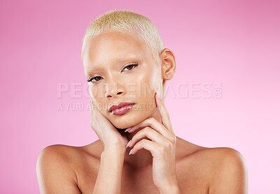 Buy stock photo Portrait, beauty and makeup with a model black woman in studio on a pink background for edgy cosmetics. Face, skincare or natural with a unique and attractive young female indoor for cosmetic care