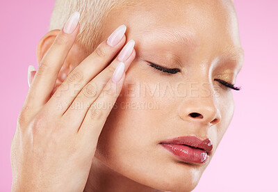 Buy stock photo Black woman, skin beauty and makeup in studio with hand, face and short blonde hair by pink background. African gen z model, girl and natural skincare for glow with wellness, aesthetic and self care