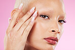 Portrait, beauty and makeup with a model black woman in studio on a pink background for edgy cosmetics. Face, skincare or natural with a unique and attractve young female indoor for cosmetic care