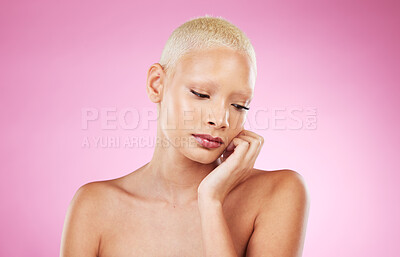 Buy stock photo Black woman, beauty and skincare of a young person with hand on face from spa wellness. Isolated, pink background and studio of a female model feeling relax from dermatology, cosmetics and makeup 