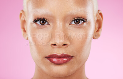 Buy stock photo Black woman, portrait and beauty cosmetics of a young model with makeup and skincare. Isolated, pink background and studio with a female feeling calm from spa wellness, dermatology and face skin glow