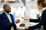 Airport, black man and passport for travel, woman assist client, smile or traveler check in. Business, African American male, passenger or ceo with ticket, employee helping with flight or immigration