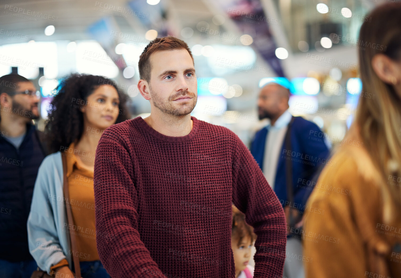 Buy stock photo Travel, queue and serious with man in airport for vacation, international trip and tourism. Holiday, luggage and customs with passenger in line for ticket, departure and flight transportation 