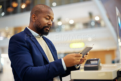 Buy stock photo Black man, reading passport and airport for travel, security and identity for global transportation service. African businessman, documents and concierge for immigration with international transport