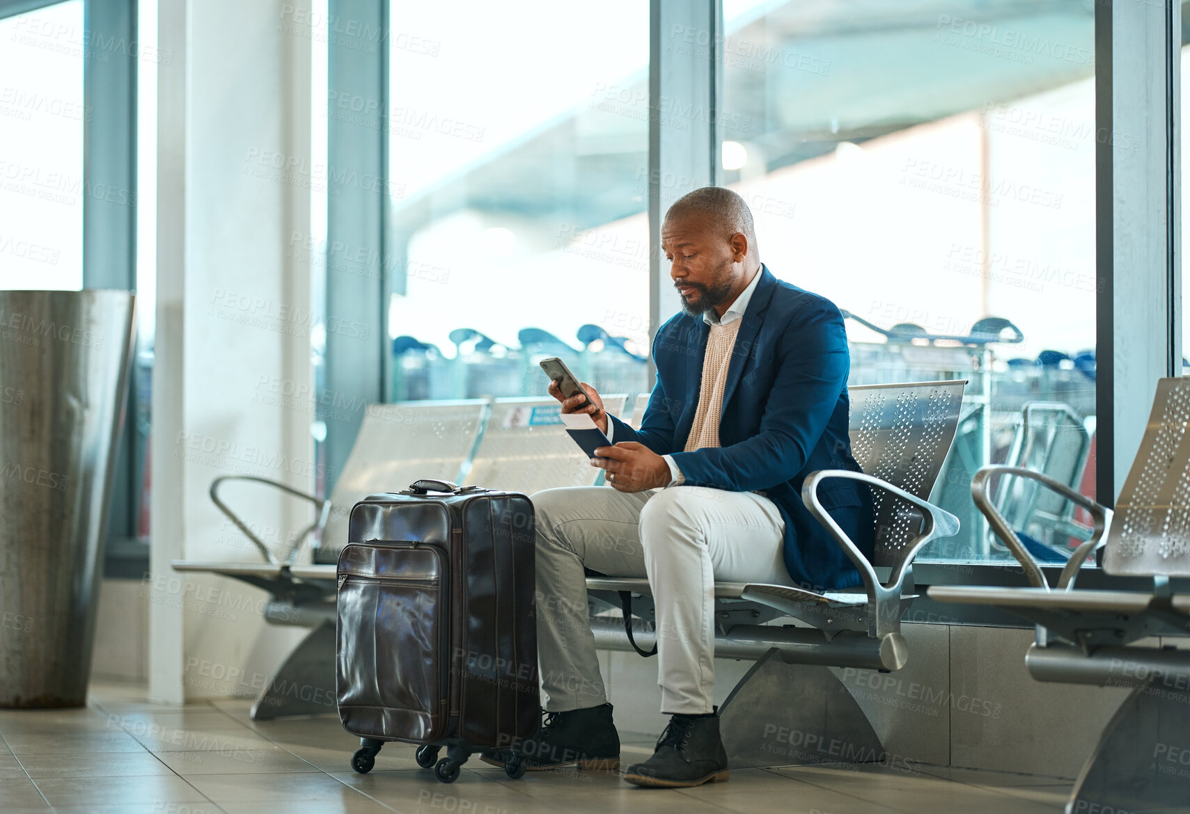 Buy stock photo Travel, passport and phone with black man in airport for social media, business trip and and networking. Communication, vacation and email with passenger on layover for first class, app and ticket