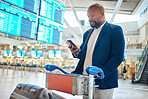Phone, passport and black man with luggage in airport while on social media or internet browsing. Suitcase, travel and male entrepreneur with trolley, boarding pass and mobile smartphone in airline.