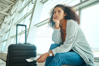 Buy stock photo Airport, travel delay and sad woman with anxiety for immigration, passport problem or schedule. Young USA person with luggage and stress, worry or thinking of flight fail, crisis or identity mistake