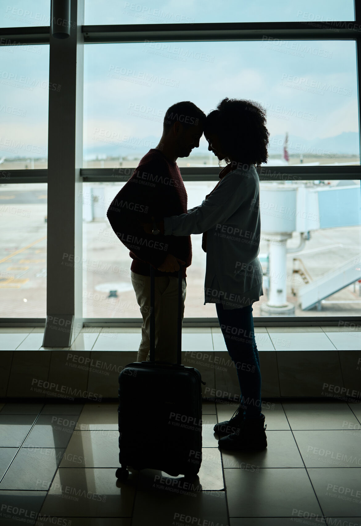 Buy stock photo Silhouette, travel and love with couple in airport and hug for departure, flight and say goodbye. Shadow, holiday and sad man and woman leave in embrace by window for journey, international