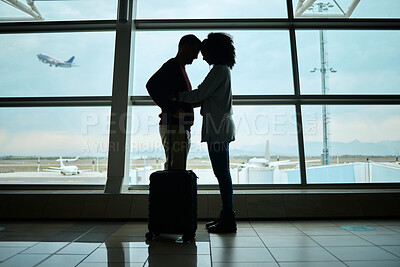 Buy stock photo Airport, couple and silhouette of love, hug and leaving on vacation on a airplane flight. Plane departure, holiday and young people shadow by a window for journey, vacation break or immigration