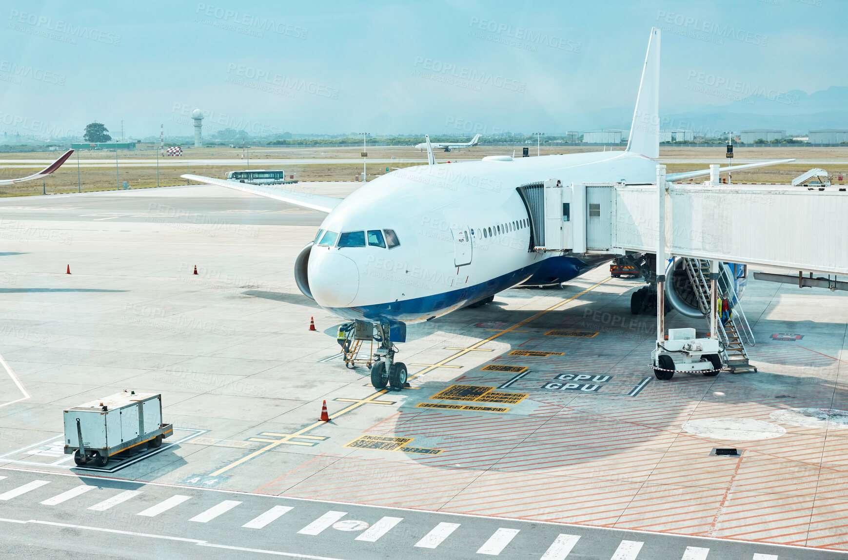 Buy stock photo Airplane, airport and runway near terminal and boarding steps for a flight for travel, logistics or commercial transport. Plane, aircraft and airline vehicle outdoors in Cape Town International