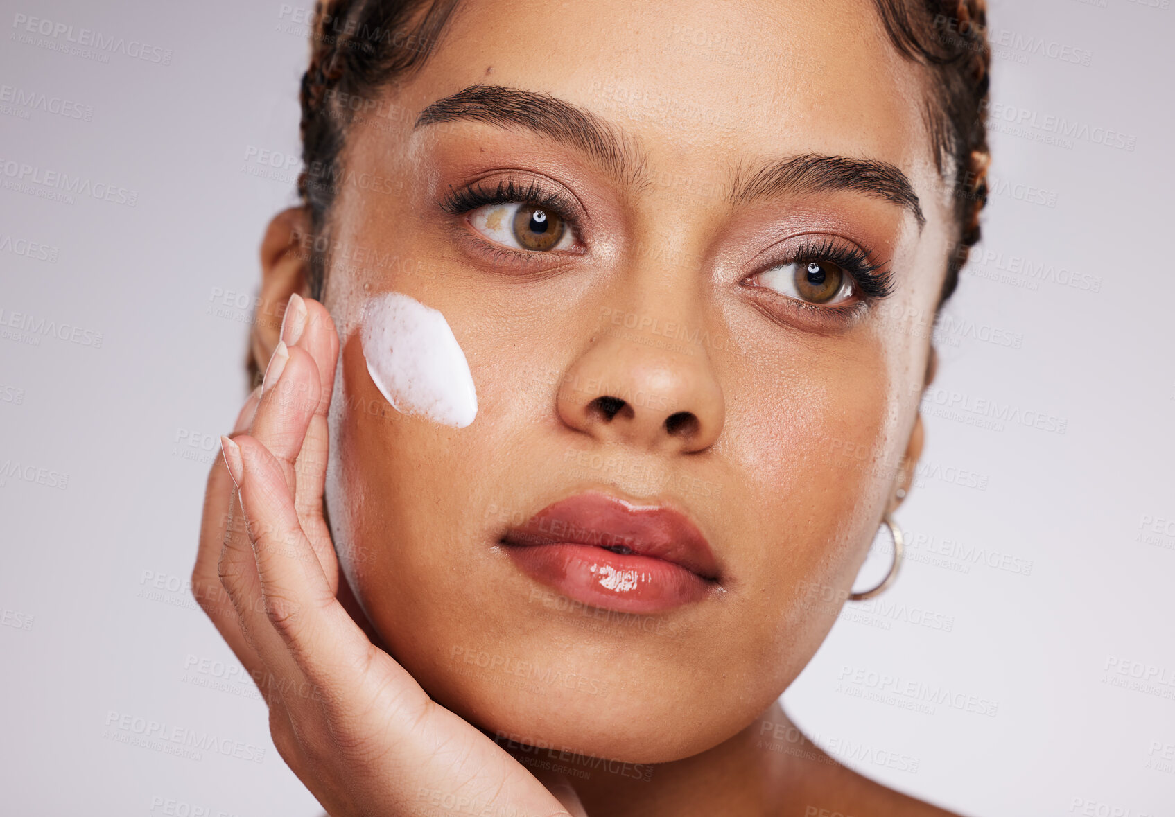 Buy stock photo Black woman, lotion and skincare of a young model with facial mask, moisturizer and wellness. Studio, beauty and female with dermatology, collagen and cosmetic face cream for skin glow and self care