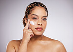 Black woman, lotion and portrait of a young model with facial mask, moisturiser and wellness. Studio, beauty and female with dermatology, collagen and cosmetic face cream for skin glow and self care