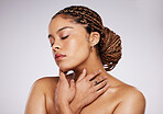 Skincare, beauty and face of black woman with eyes closed in studio isolated on a gray background. Makeup, cosmetics or female model with glowing, healthy and flawless skin after spa facial treatment