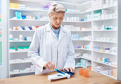 Pharmacy woman, pills and counting in store for stock, product and medicine for health on table with tools. Pharmacist sorting, management and focus for retail pharma for healthcare service in shop