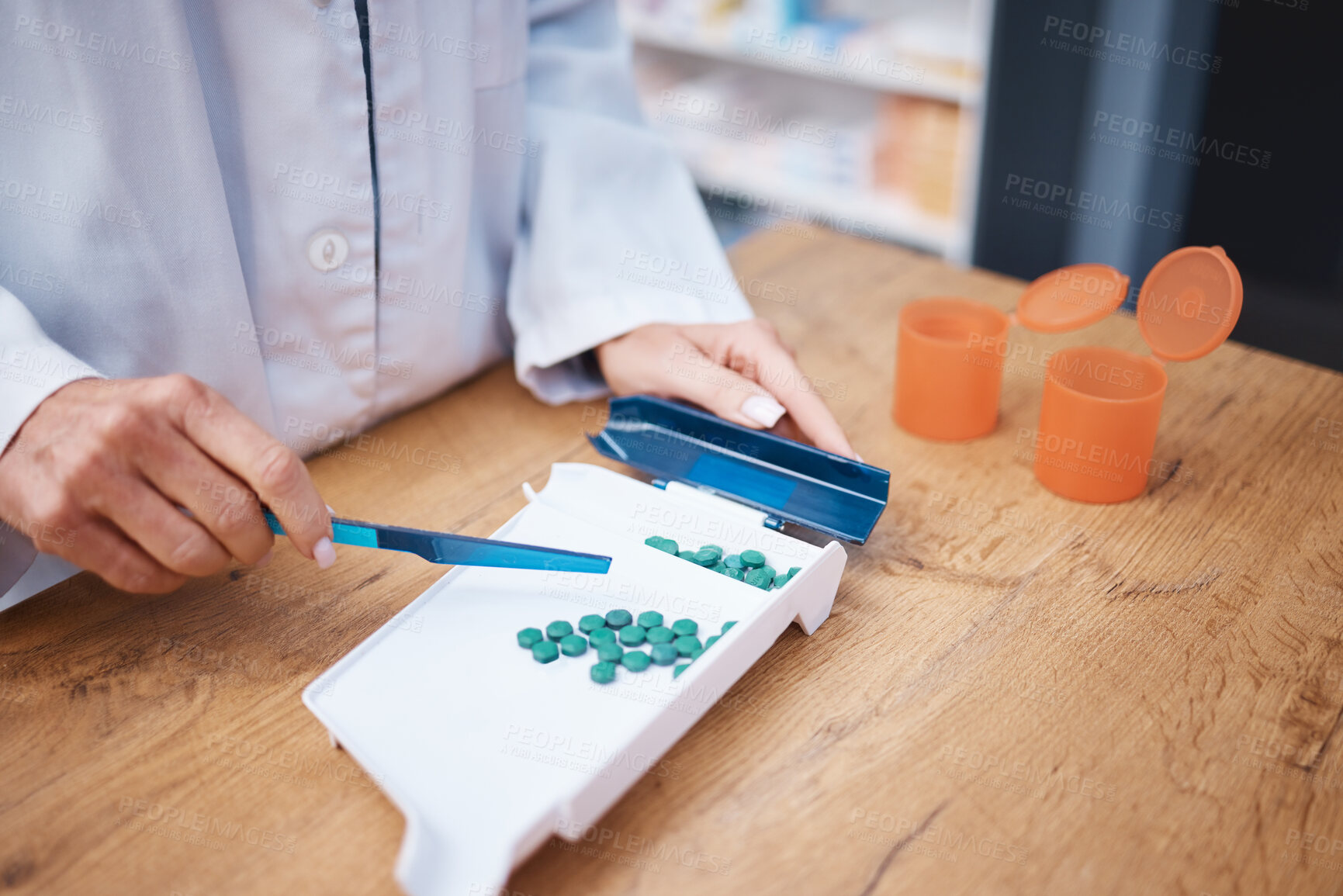 Buy stock photo Medicine, pharmacist and organize pills for pharmacy correct dose, inventory and pharmaceutical management. Woman or doctor hands with healthcare tablet, medical product or retail stock distribution 